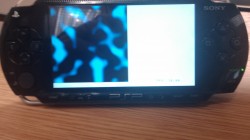 A picture of PlayStation Portable Developer Kit with my simplex noise demo scene being rendered on the device.