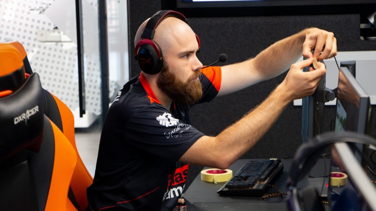 Anthony "MassE" Massey setting up his monitor ahead of the tournament. The picture was taken inside the conference room we were competing from.